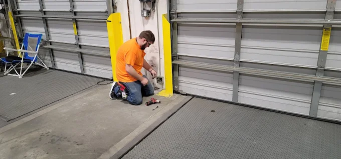 King Security Solutions team member preparing security equipment for a customer installation